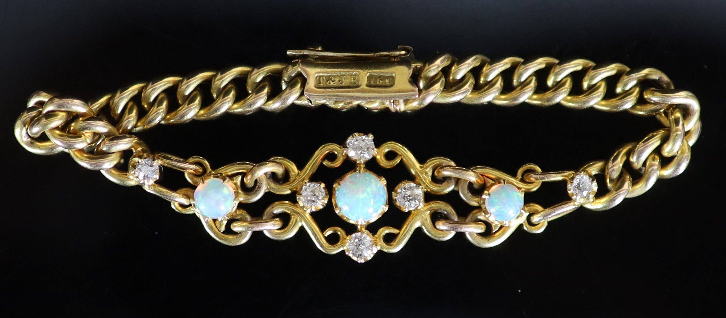 An early 20th century 15ct gold white opal and diamond set curblink bracelet